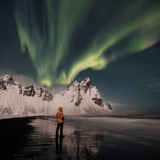 Northern,Lights,,Aurora,Borealis,Over,Vestrahorn,Mountains,In,Iceland,And